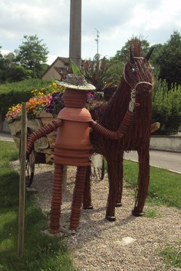 Un bonhomme en pot de fleur